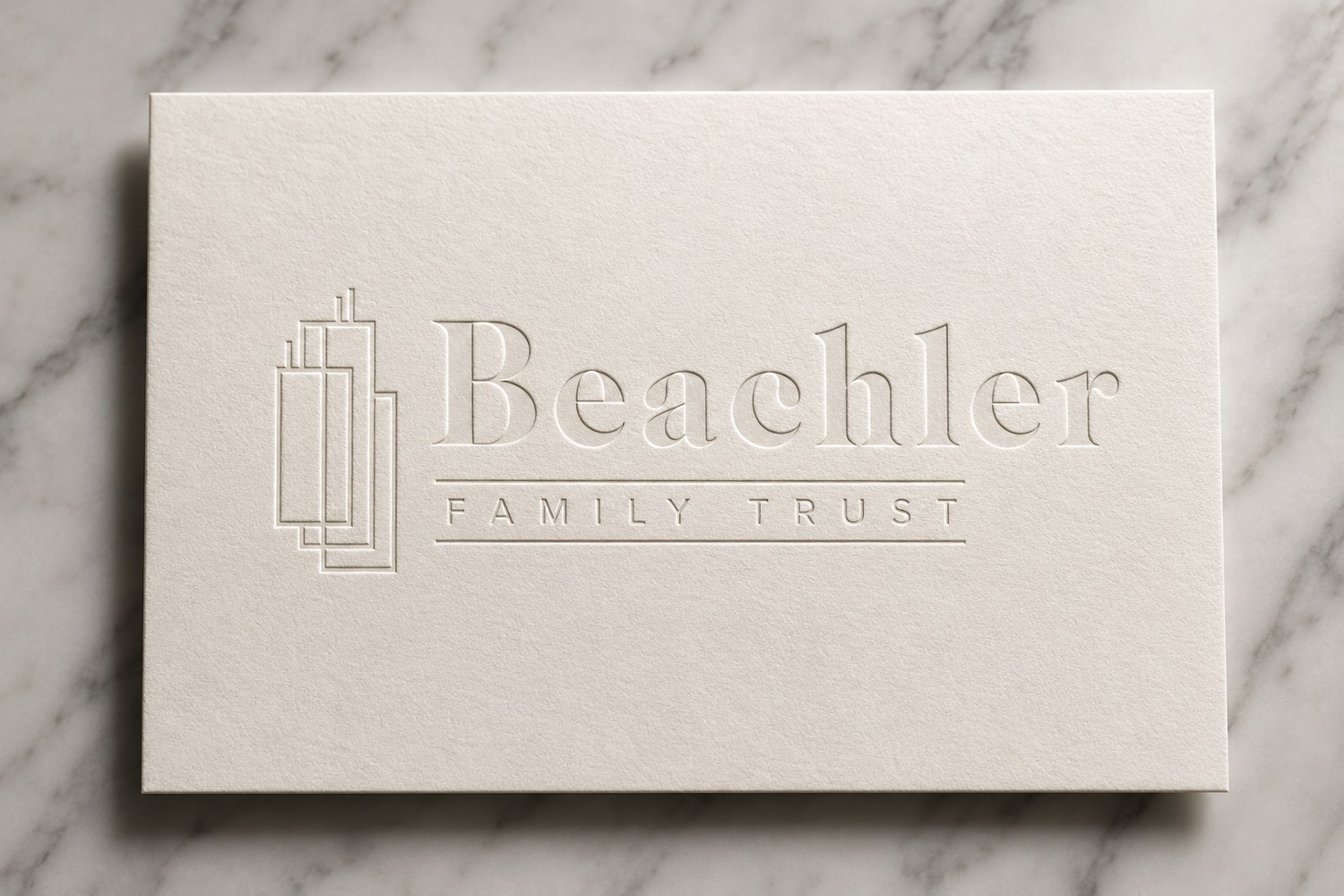 Beachler Family Trust logo letterpress-debossed on cotton paper